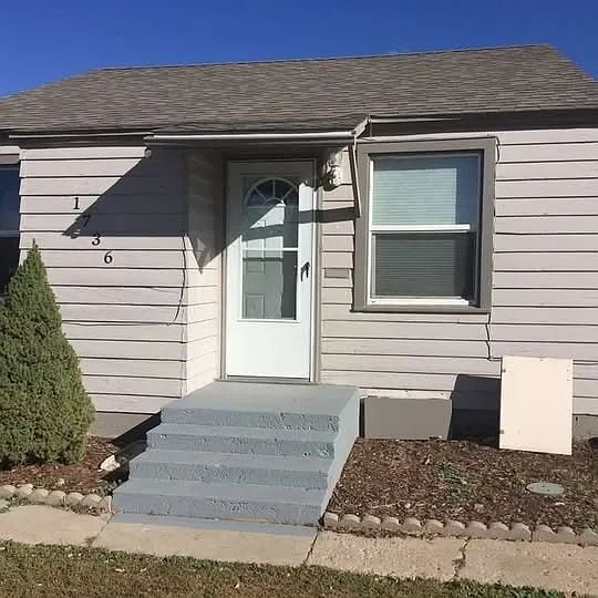 "Charming 3-Bedroom Home with Hardwood Elegance on Hanover Street, Aurora!"