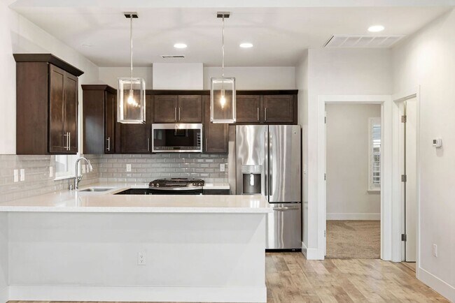 Photo - Contemporary Dual Level MidTown Bungalow with Balcony & Garage!