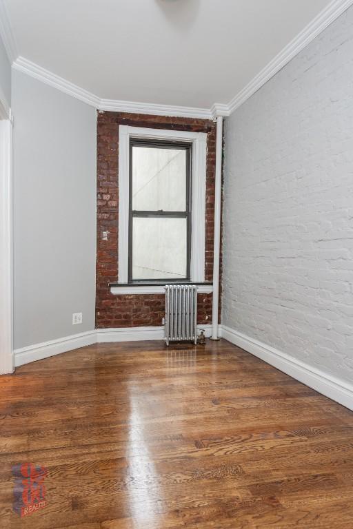 Building Photo - 410 E 13th St Unit 5C Rental