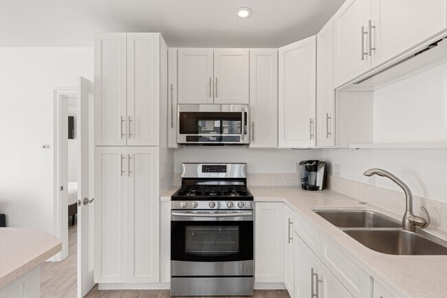 Photo - Charming 1BR/1BA Cottage - Private Patio w/ Hot Tub - Walk to the Beach