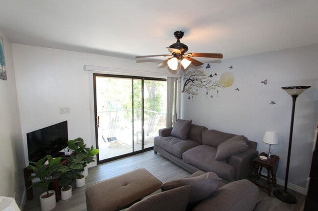 Photo - Fully Furnished 2BR Condo | Private Balcony + Covered Parking