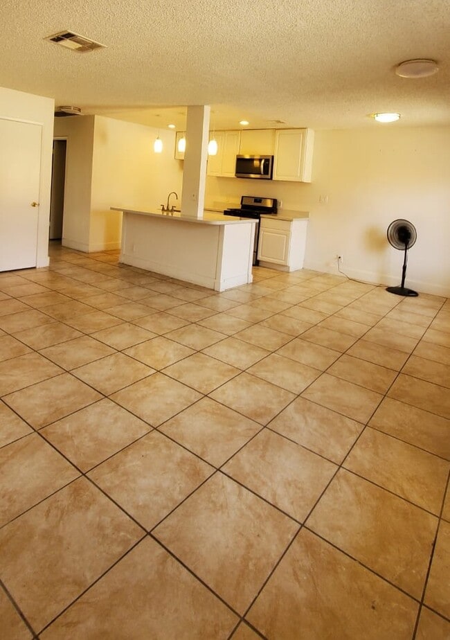 Zona de estar/comedor/cocina de planta abierta