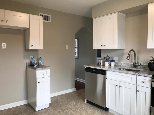 Photo - Updated Cottage with Garage & Privacy Fence