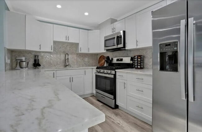 Photo - Home For Rent in St Pete with TONS OF UPGRADES & FENCED IN YARD!