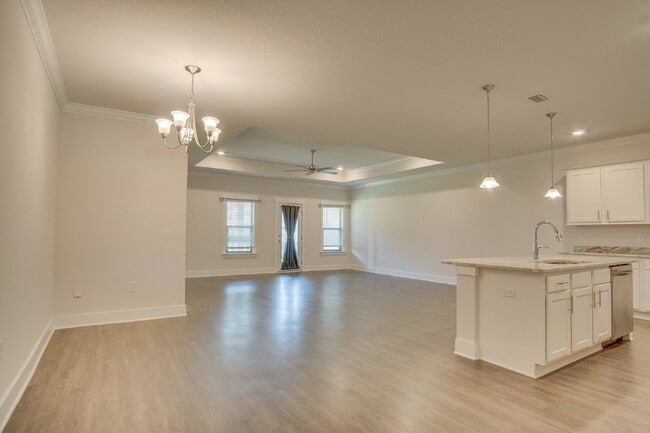 Photo - Spacious Cantonment Townhome with Open Layout, 2-Car Garage, Covered Back Porch & Easy Access to ...