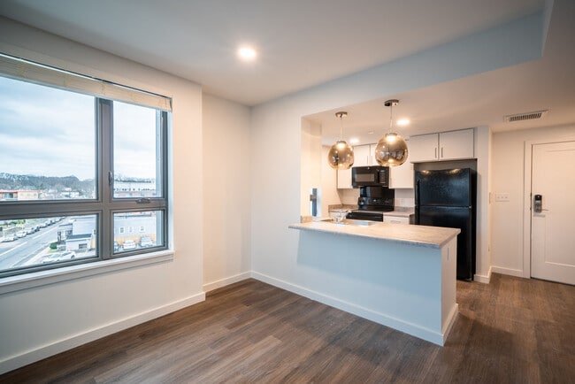 The Loop Living Area - The Loop at Mattapan Station