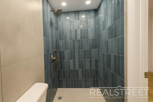 Photo - Spacious 2-Bedroom, 2-Bath Apartment in Bed-Stuy with Modern Amenities
