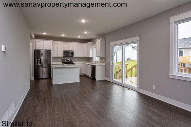 Photo - Like-New 4-Bedroom Home in Heritage Park –...