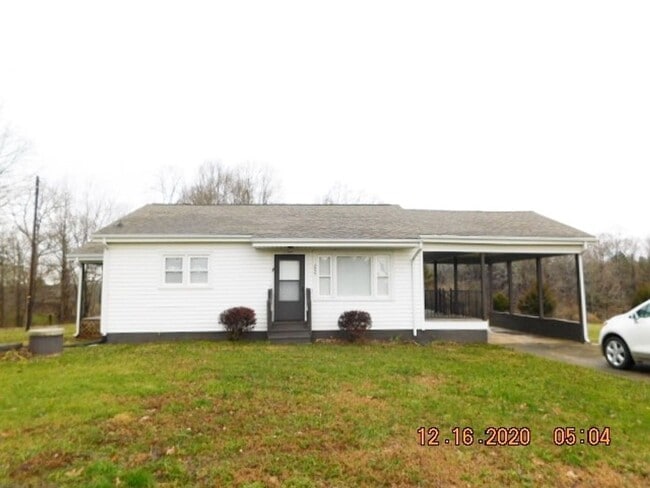 Building Photo - Home with 2 bedrooms, 1 bath, side deck, carport with side porch and detached garage