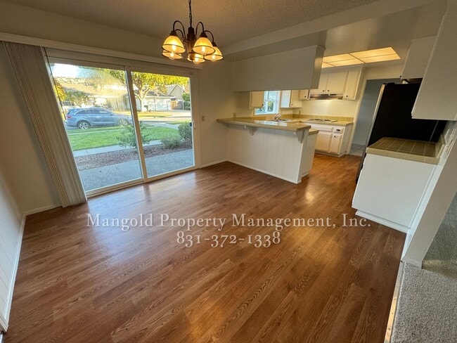 Photo - Beautiful 4-bed 2-bath Home with Cozy Fireplace and Large Backyard!