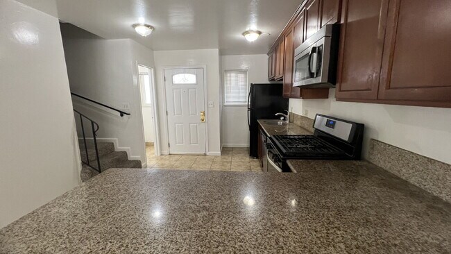 Photo - NO RENT DUE FOR DECEMBER - Updated interior - must see!  Parking On Site - Laundry On Site Unidad D