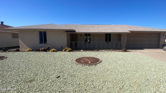 Building Photo - 9513 W Newport Dr Rental
