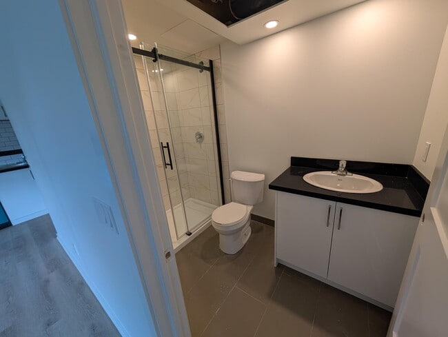 Building Photo - Newly built beautiful bachelor apartment for rent Unit 1