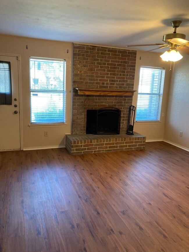 Living room and fireplace - 505 Pecan Acres Ct Unit 505 Pecan Acres Court