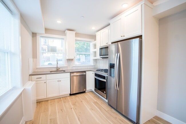 Building Photo - 4926 Locust St Unit 1
