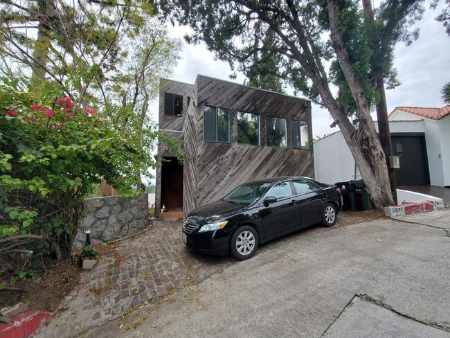 Front of house with parking spot - 2635 Hollyridge Dr