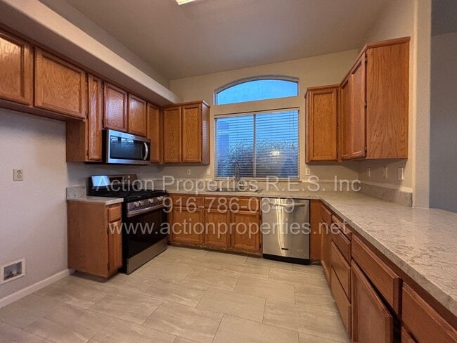 Photo - Updated 4 Bed, 2 Bath - 3 Car Garage - New Flooring - Close to Schools, Parks, and Shopping!