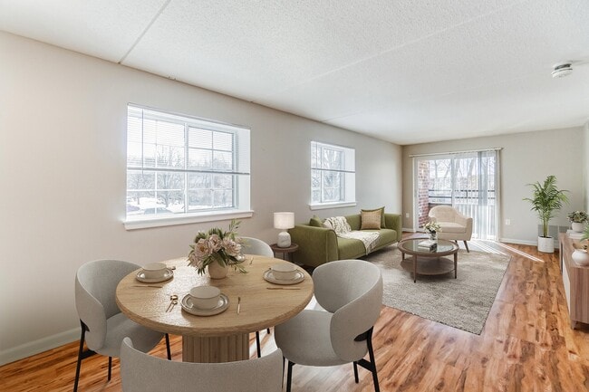 Step into comfort and style at Eagle Rock Apartments at Swampscott. Our inviting living and dining spaces are perfect for relaxation and entertaining. Explore your new home today and envision the lifestyle that awaits you! - Eagle Rock Apartments at Swampscott