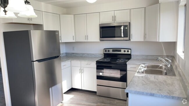 Building Photo - Modern 2-Bedroom Duplex with New Kitchen &... Rental