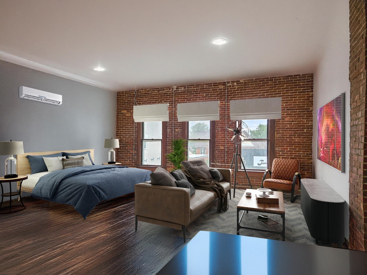 This is a virtual rendering of the space. This unit has a large kitchen with granite, washer/dryer. - 9 S Main St Apartments