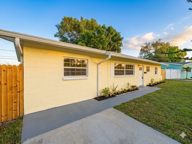 Photo - Newly Remodeled 3BR Home in Coquina Key – Large Yard with Dual Side Access