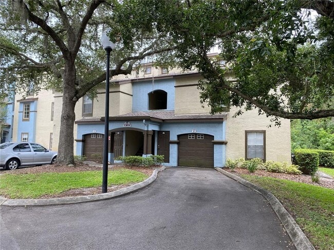 Building Photo - 13212 Arbor Isle Dr Unit 201