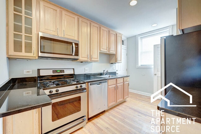 Building Photo - 6442 N Leavitt St Unit 2W Rental