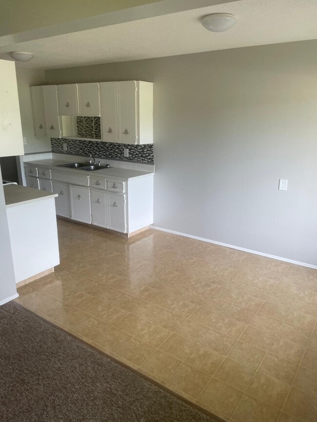 Building Photo - 4507-244 44 Ave Unit 201