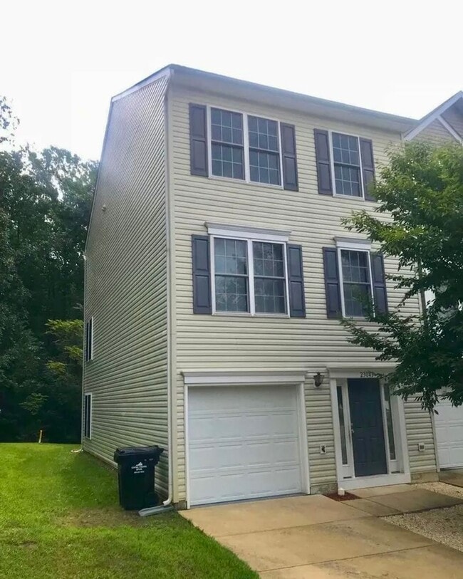 Photo - $2,295/Month | 3 Bed | 2.5 Bath | End-Unit Townhome in Belmont at Carmel Church | New HVAC | Wood...