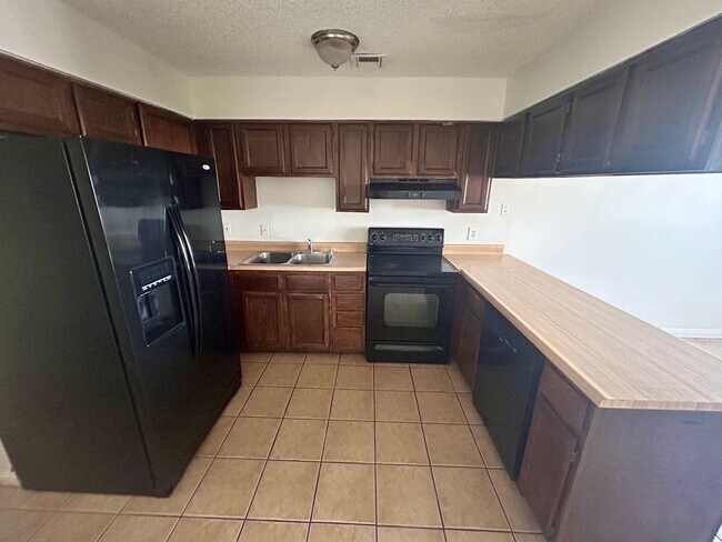 Photo - 2/BD 1/BA First Floor Condo w/ In Unit Laundry Unit 1