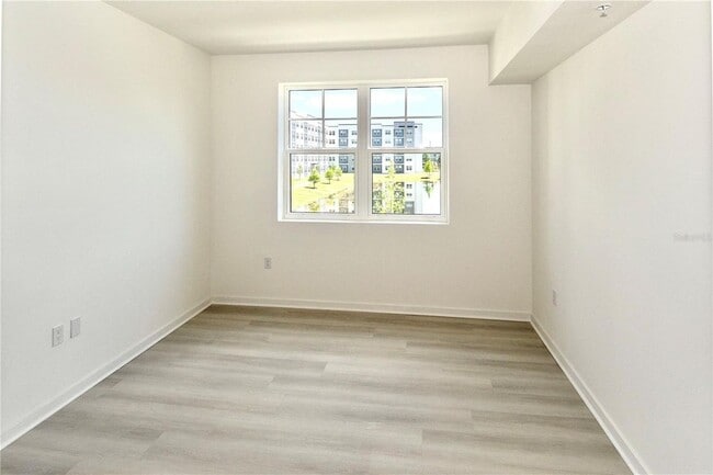 Photo - 5579 Millenia Park Blvd Unit #209