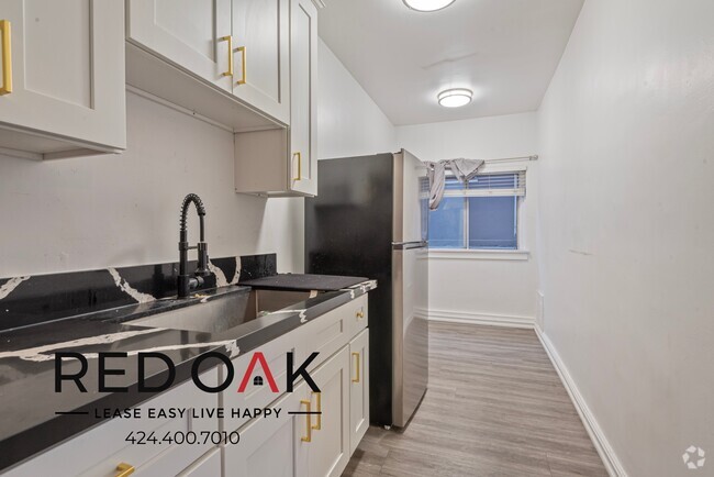 Building Photo - Stunning, Sunlit One-Bedroom, with Trendy ... Unit 301 Rental