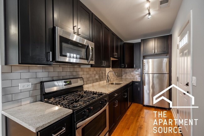 Building Photo - 2207 W Eastwood Ave Unit 2N