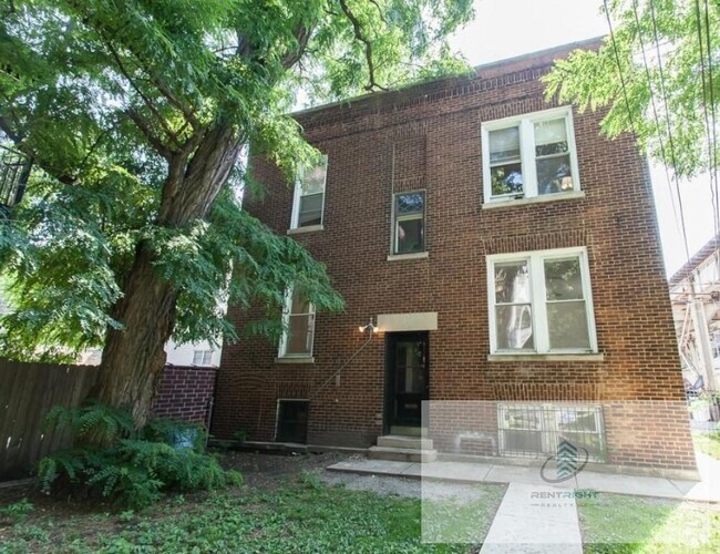 Building Photo - 3421 N Seminary Ave Unit 2F Rental