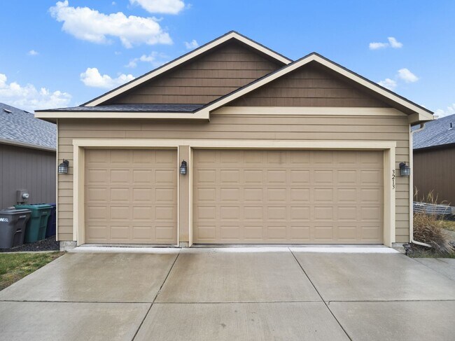 Photo - Spacious 5-Bedroom Home with Private Yard & Parking in Spokane