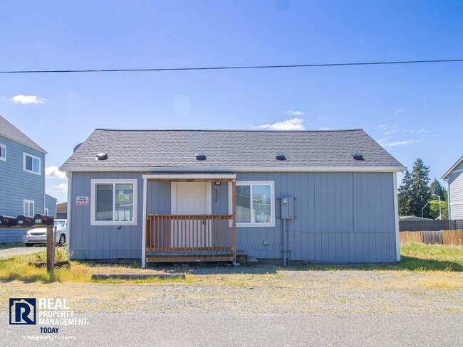Photo - MOVE-IN SPECIAL! Completely Renovated 2 Bedroom Home Near PLU | New Kitchen & Stainless Appliances
