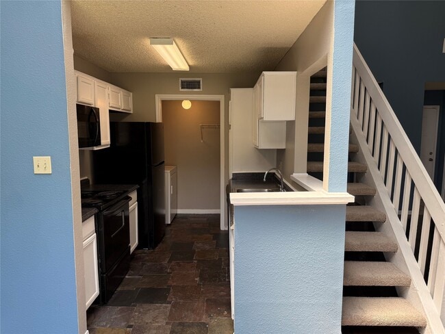 Building Photo - 8579 Sands Point Dr Unit 102 Rental