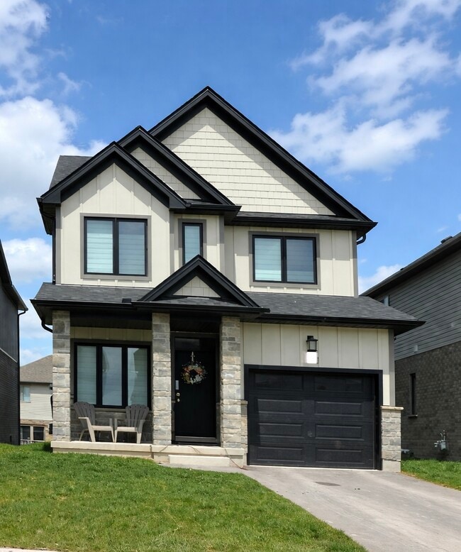 Building Photo - Three + Den House in London