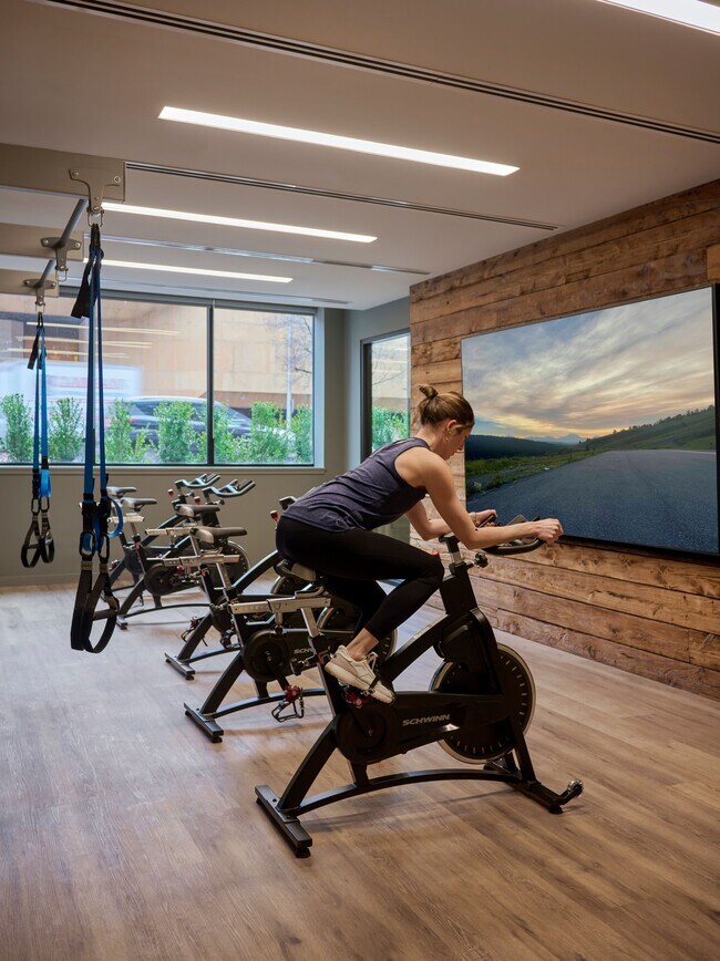 Fitness center featuring spin and cardio equipment