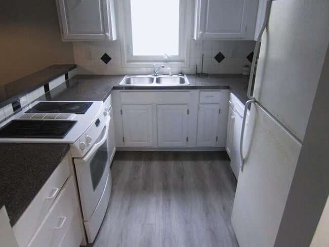 Photo - 1 BD/1.5BA Loft Condo Water & Electric Included