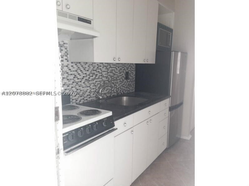 Photo - 9920 Collins Ave Unit 7
