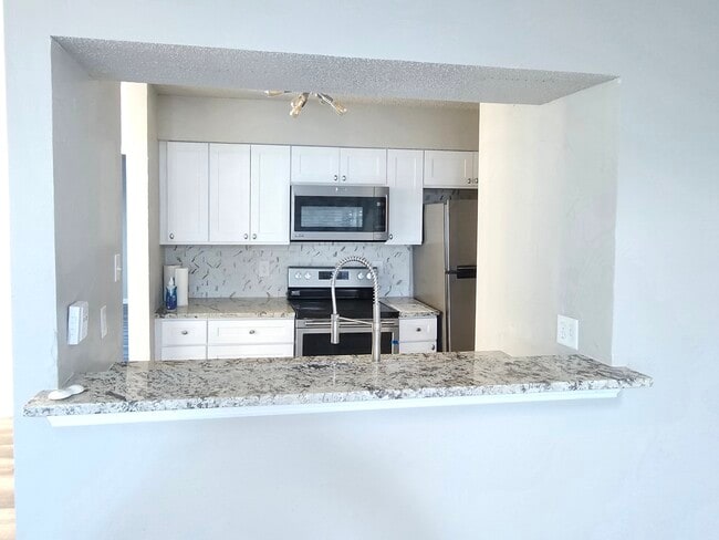 5616 Preston Oaks Rd Unidad 202