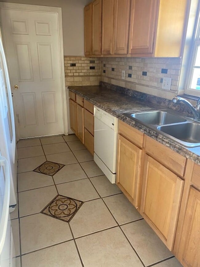 Photo - 2 Bed 1 Bath Home | Single Car Garage | Pet Friendly with Fenced Yard | Washer Dryer Hook Ups | S...