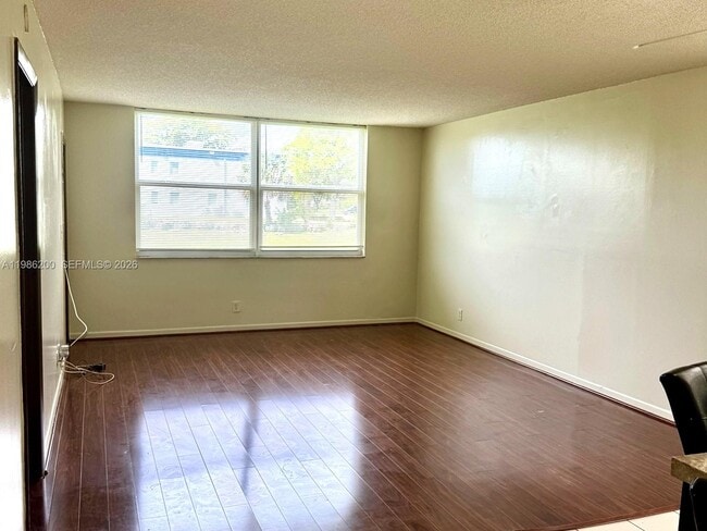 Building Photo - 6870 Royal Palm Blvd Unit 117M