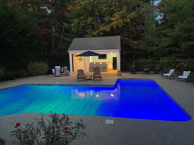 Pool with Cabana from back porch - 10 Bartley Dr