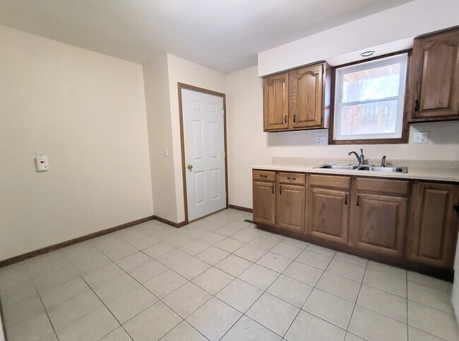 Kitchen, entrance to backyard - 108 Center Street Ct Unit Apt