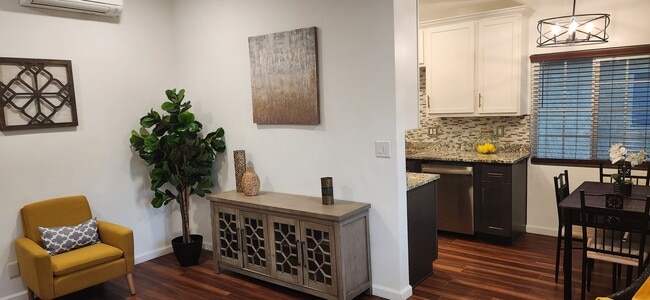 Staged Living room and Diningroom. Recessed lighting ans Split Unit Ac and Heating - 1517 18th St Apartments Unit E