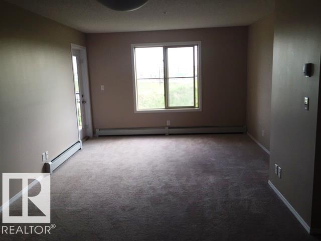 Photo - #206 12035 22 AV SW SW