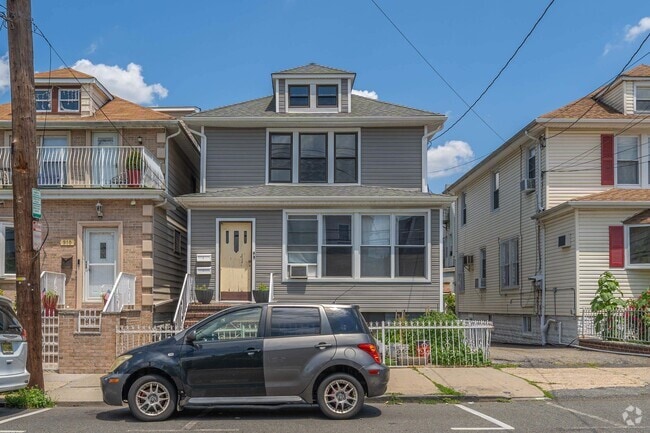 Building Photo - 906 76th St Unit 2 Rental