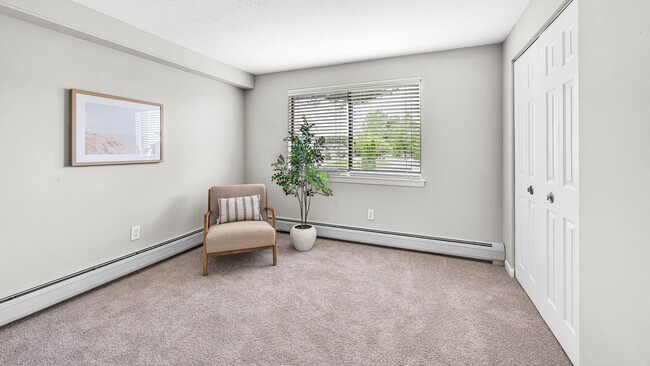 Indulge in the tranquility of our roomy bedroom, a restful oasis complete with a large closet containing built-in organizers for a tidy and relaxing environment.